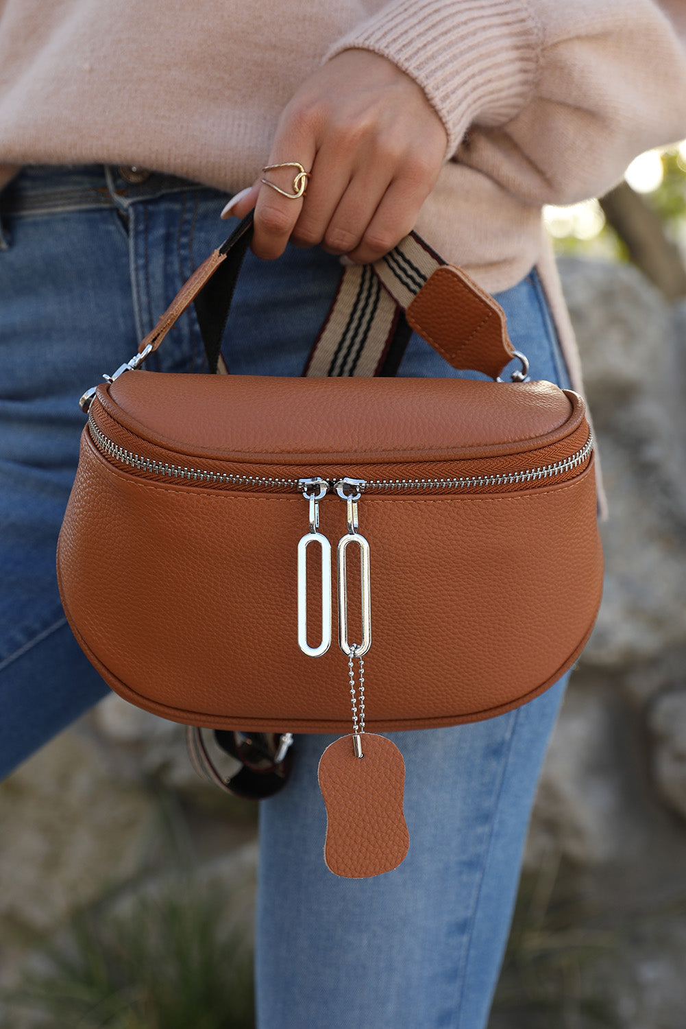 Crossbody bag with striped strap sale